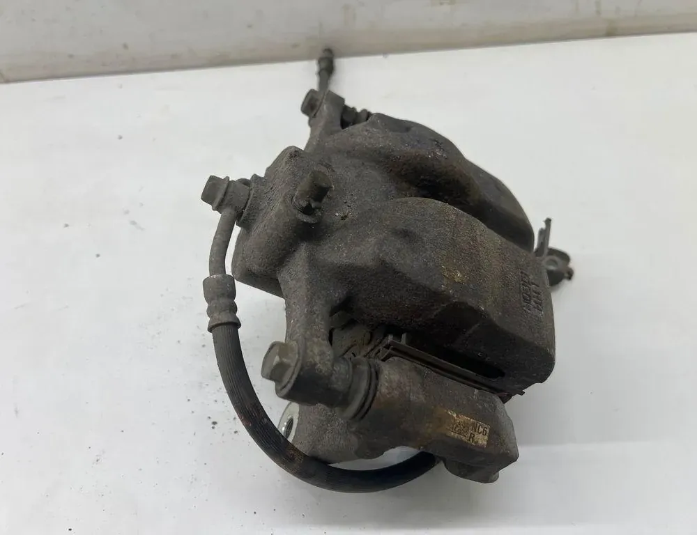 HYUNDAI Ioniq AE (2016-2023) Pravý přední třmen brzdy NC6 34062718